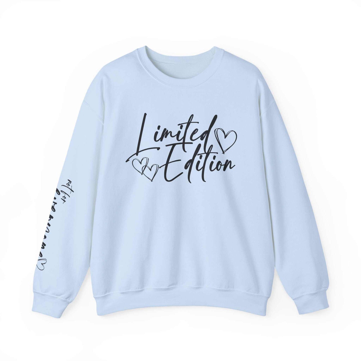 White crewneck sweatshirt with black "Limited Edition" script and hand-drawn hearts on chest and sleeve