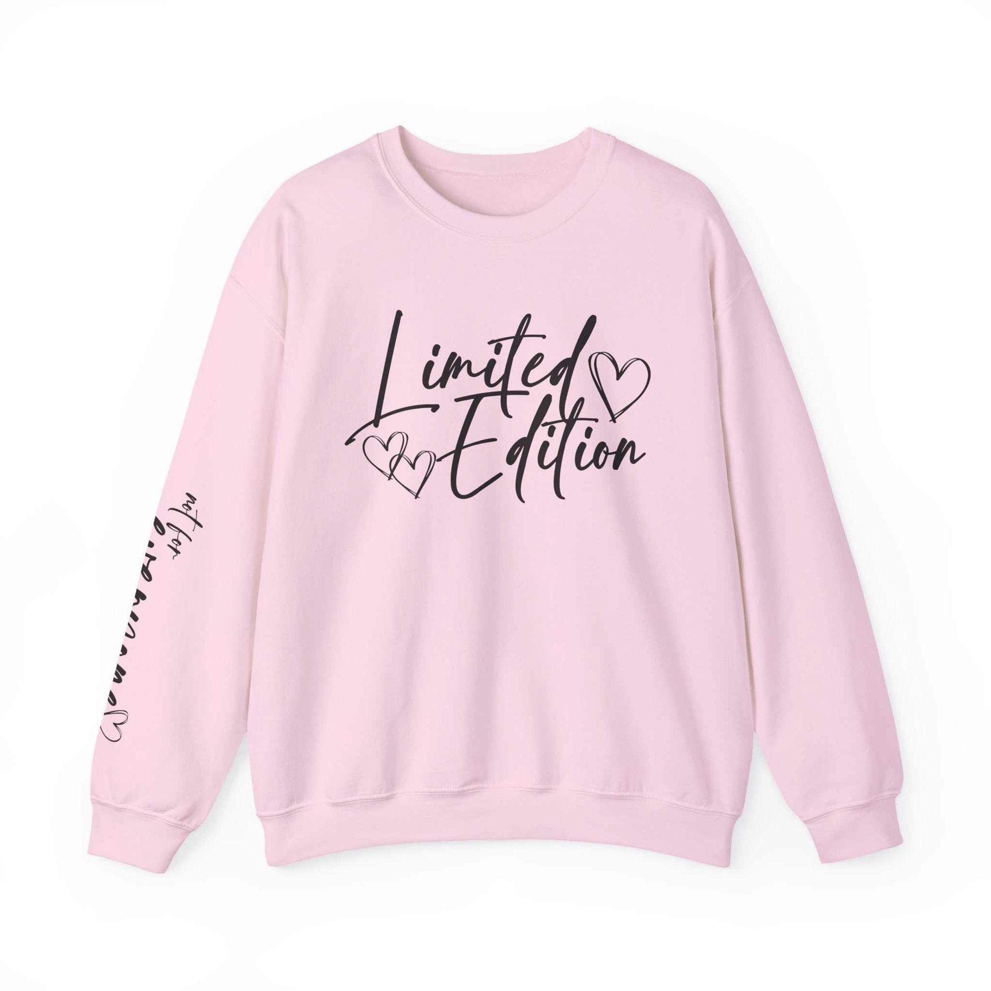 Pink Limited Edition Script Hearts Sweatshirt with black script and heart designs on chest and sleeve, cozy crewneck style