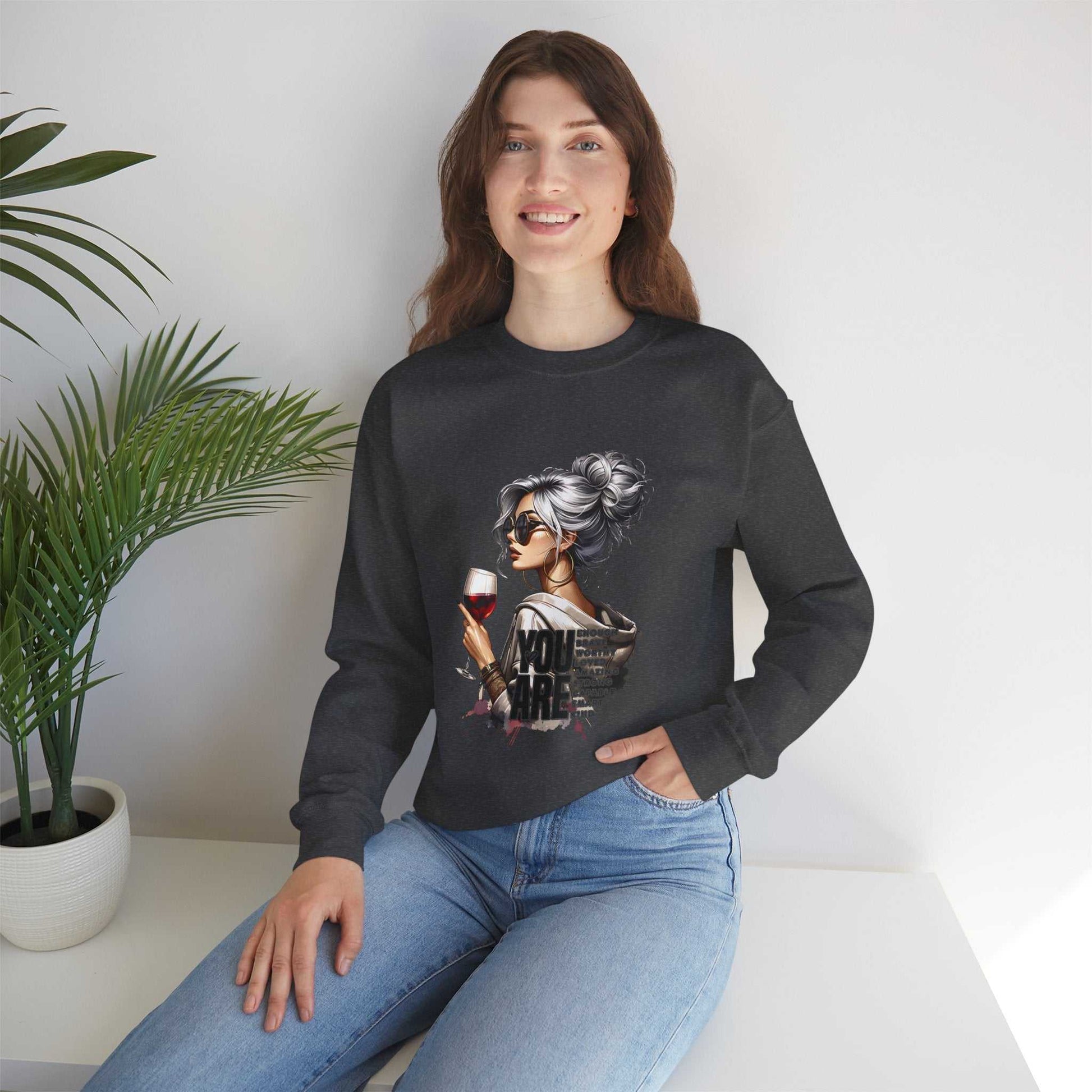 Woman wearing Chic Woman with Wine Sweatshirt featuring silver-haired woman graphic holding wine glass