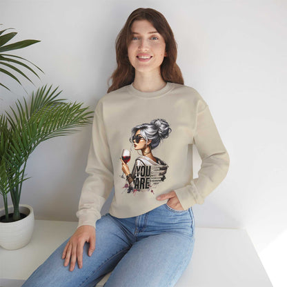 Chic woman with silver hair and sunglasses holding wine glass printed on cozy crewneck sweatshirt worn by smiling woman