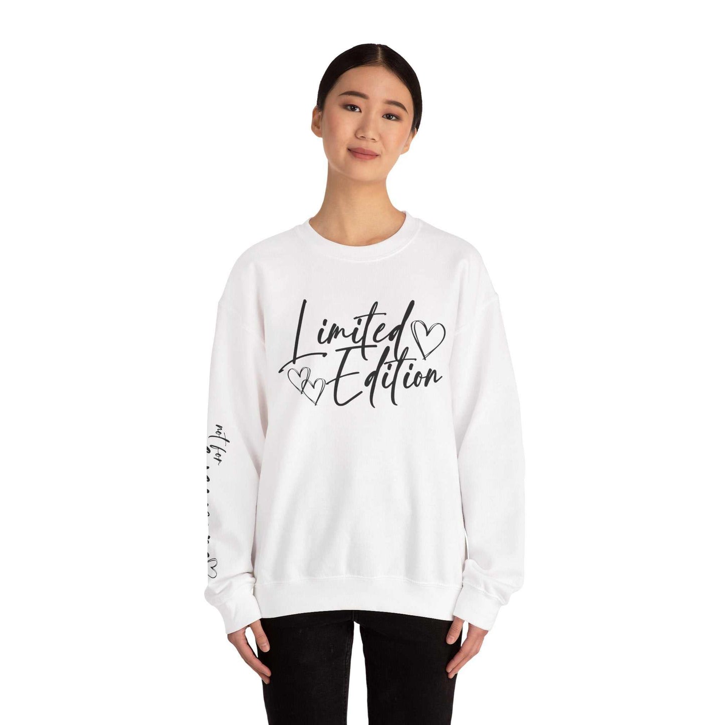 Woman wearing white Limited Edition Script Hearts Sweatshirt with black script and heart designs on chest and sleeve