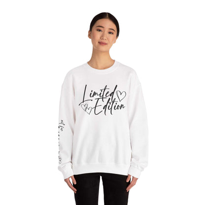 Woman wearing white Limited Edition Script Hearts Sweatshirt with black script and heart designs on chest and sleeve