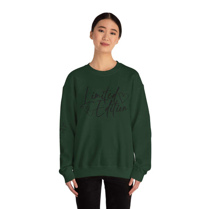 woman wearing dark green Limited Edition Script Hearts Sweatshirt with black script and heart design on chest and sleeve