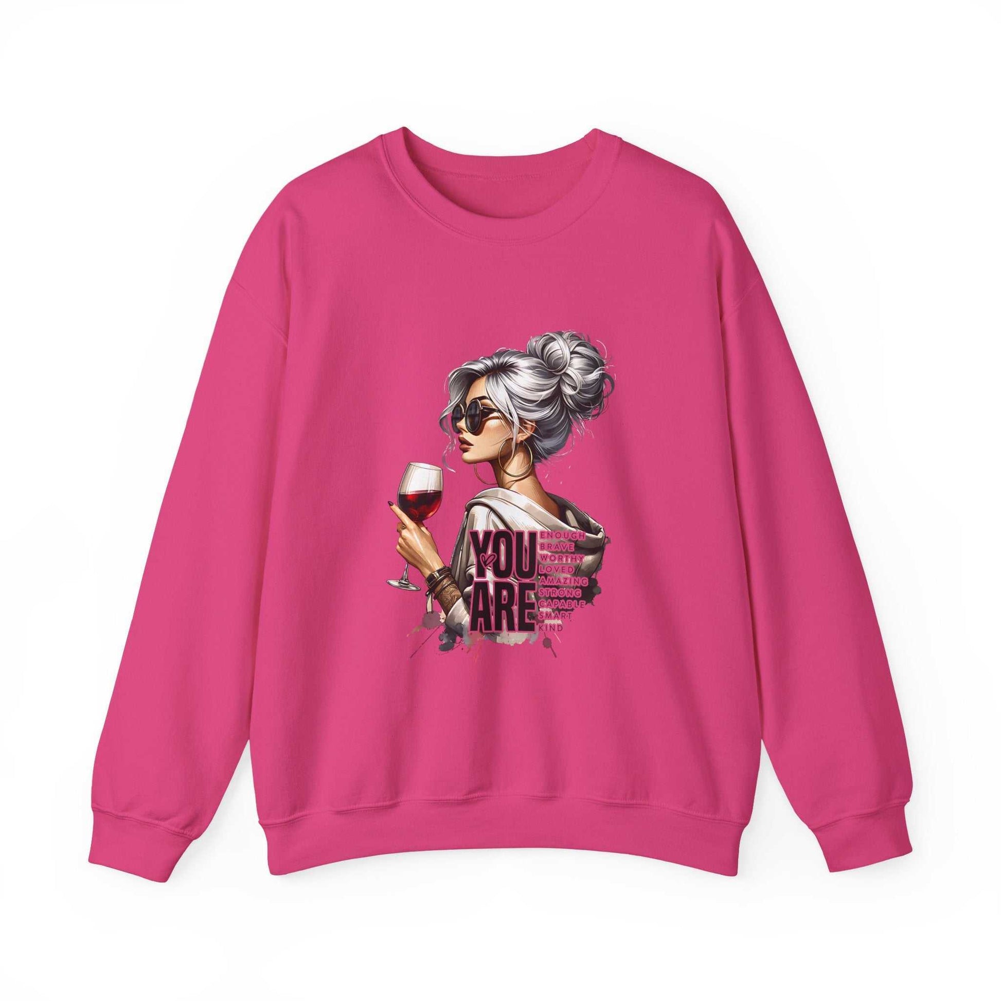 Pink crewneck sweatshirt with chic woman holding wine glass graphic and "You Are Loved" text