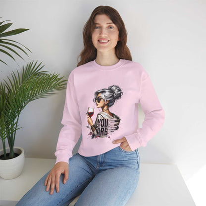 Woman wearing pink Chic Woman with Wine Sweatshirt with graphic of silver-haired woman holding wine glass