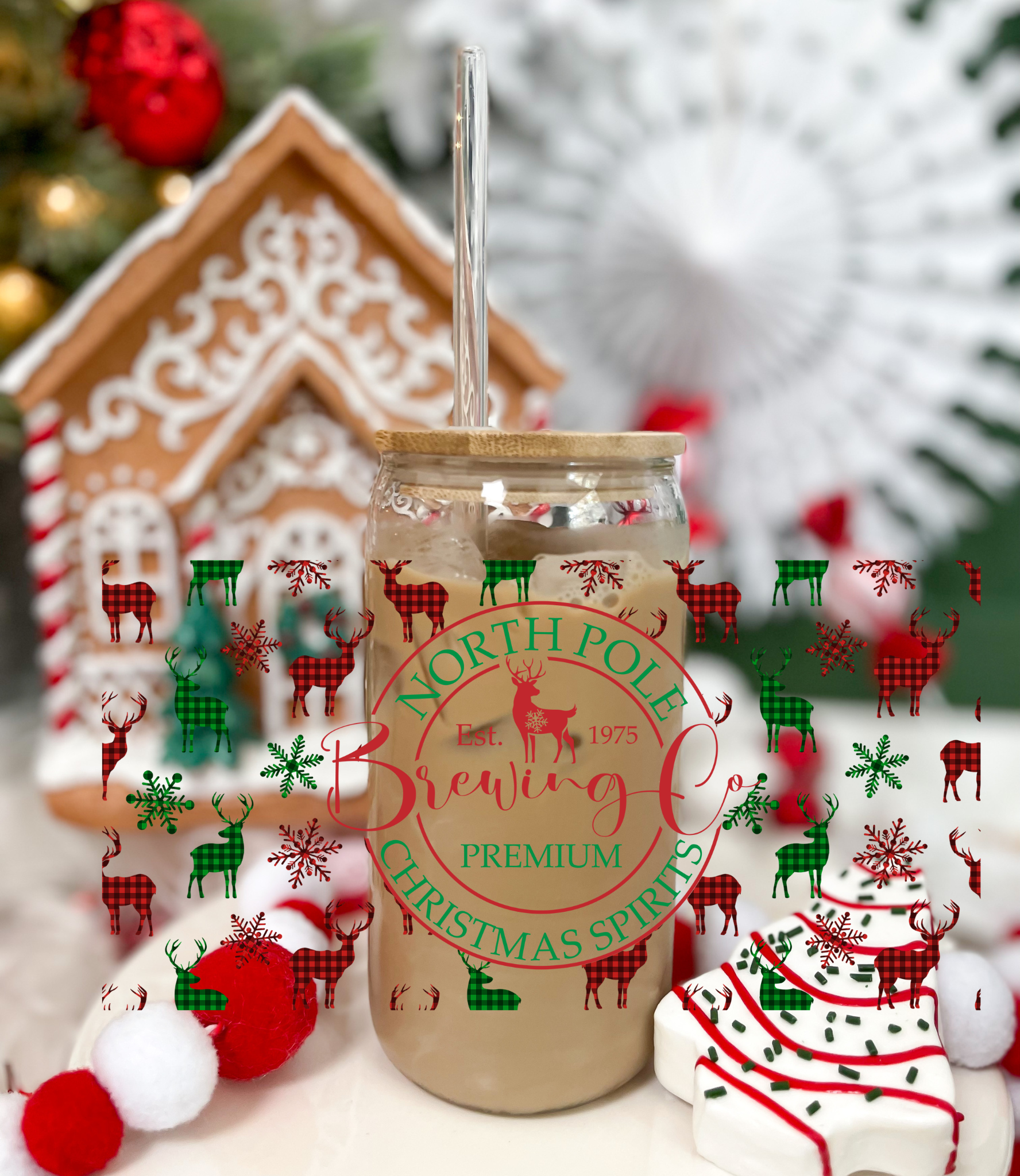 North Pole Brewing 16oz glass can with acrylic lid and straw festive design