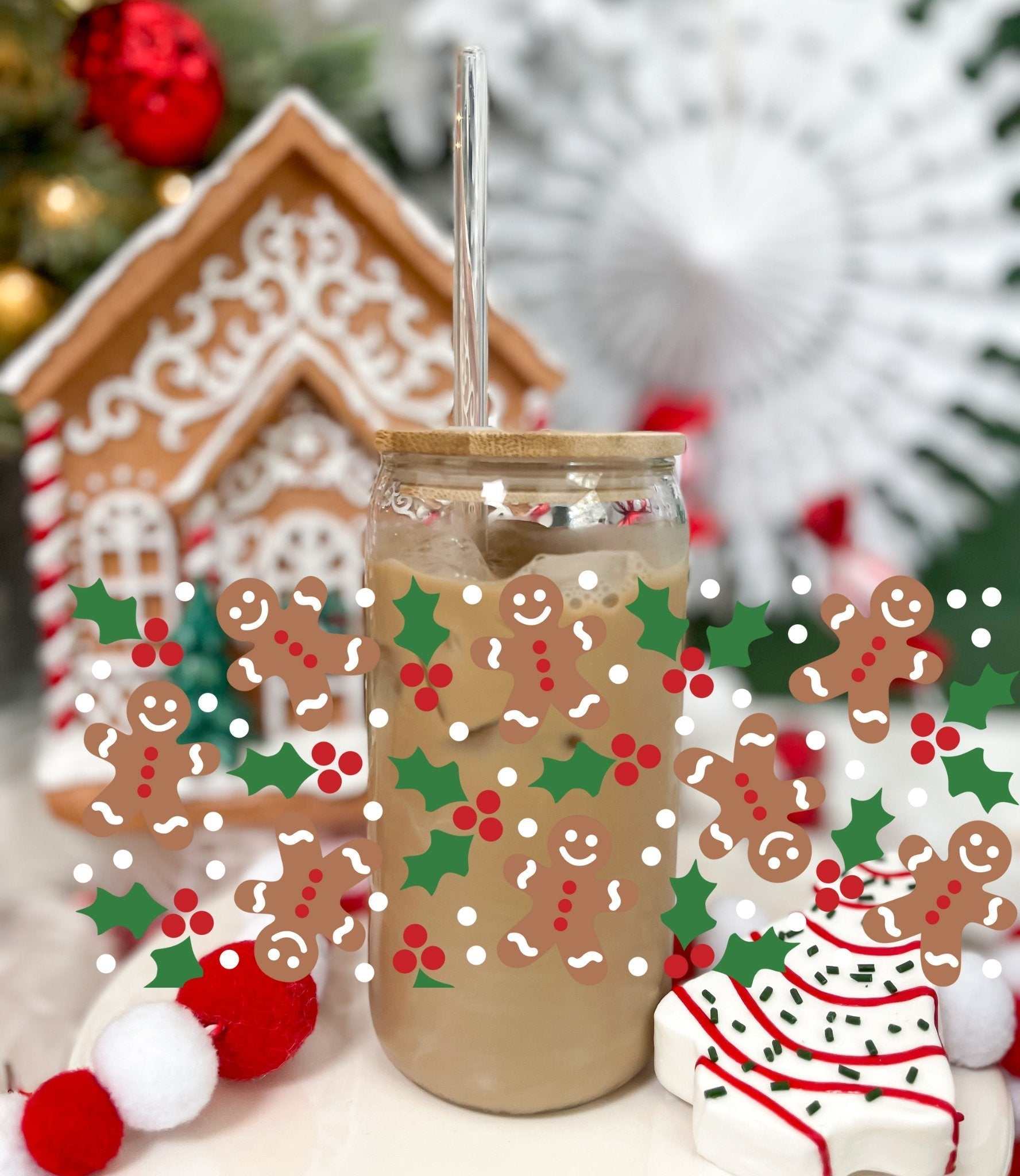 Ginger Bread glass tumbler with acrylic lid and straw, decorated with holiday-themed gingerbread men and holly patterns
