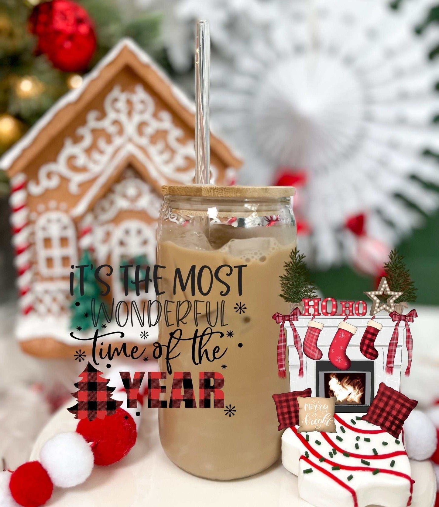16oz glass tumbler with "It's the Most Wonderful Time of the Year" text, acrylic lid, and straw, festive holiday decor background