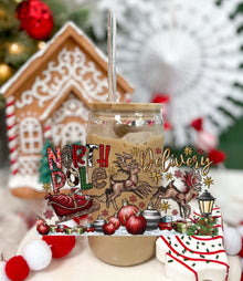 North Pole Delivery 16oz glass with acrylic lid and straw featuring festive holiday design with reindeer and sleigh